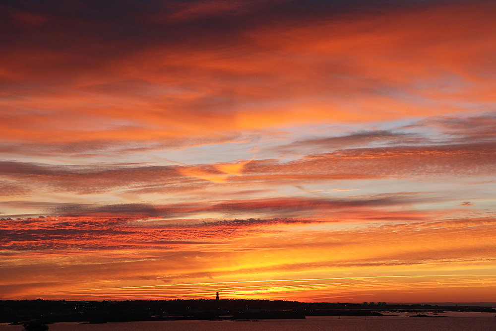 Sunrise at Noirmont by Mick Dryden