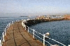 La Rocque Breakwater by Mick Dryden