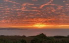 Sunrise at Noirmont by Mick Dryden